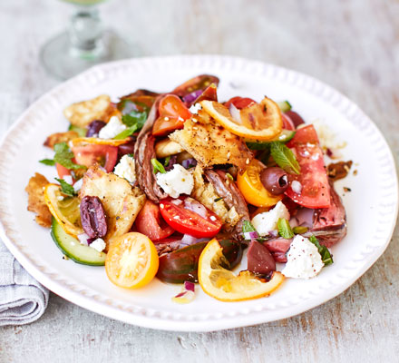 Steak panzanella salad with roasted lemons