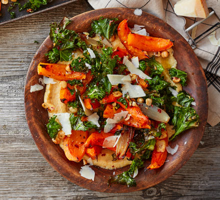 Soft polenta with roast squash, kale & hazelnuts