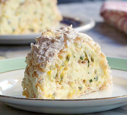 Meringue roulade with passion fruit cream