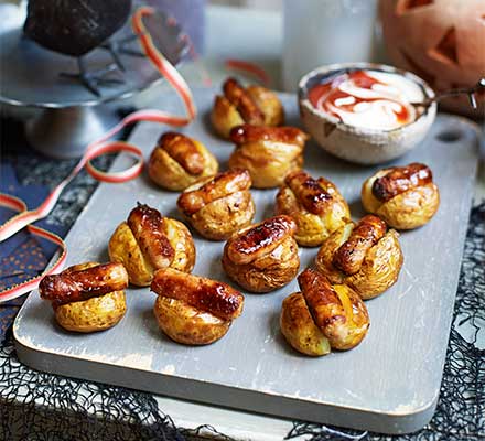 Halloween mini baked potatoes with sticky sausages