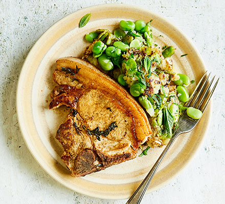 Pork chops with broad bean & minted Jersey smash