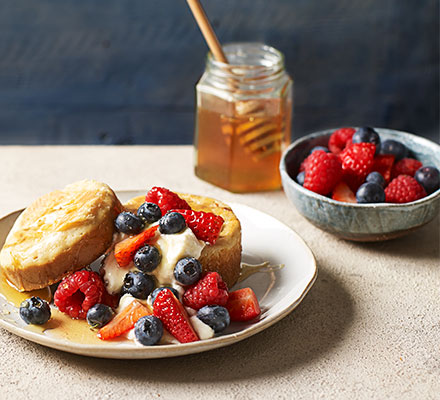 Homemade crumpets with ricotta, berries & thyme honey