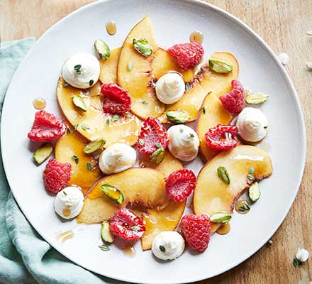 Peach & raspberry fruit salad with mascarpone