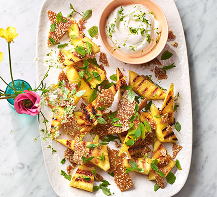 Spiced grilled pineapple with maple sesame brittle