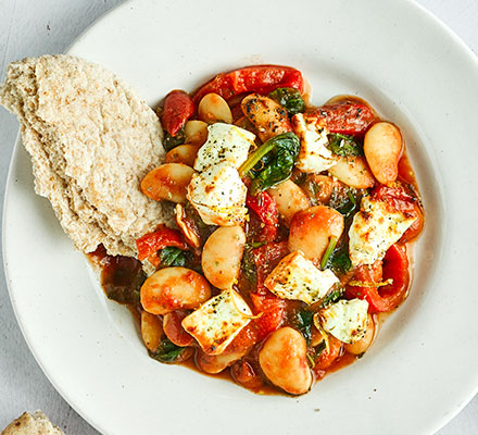 Crispy grilled feta with saucy butter beans