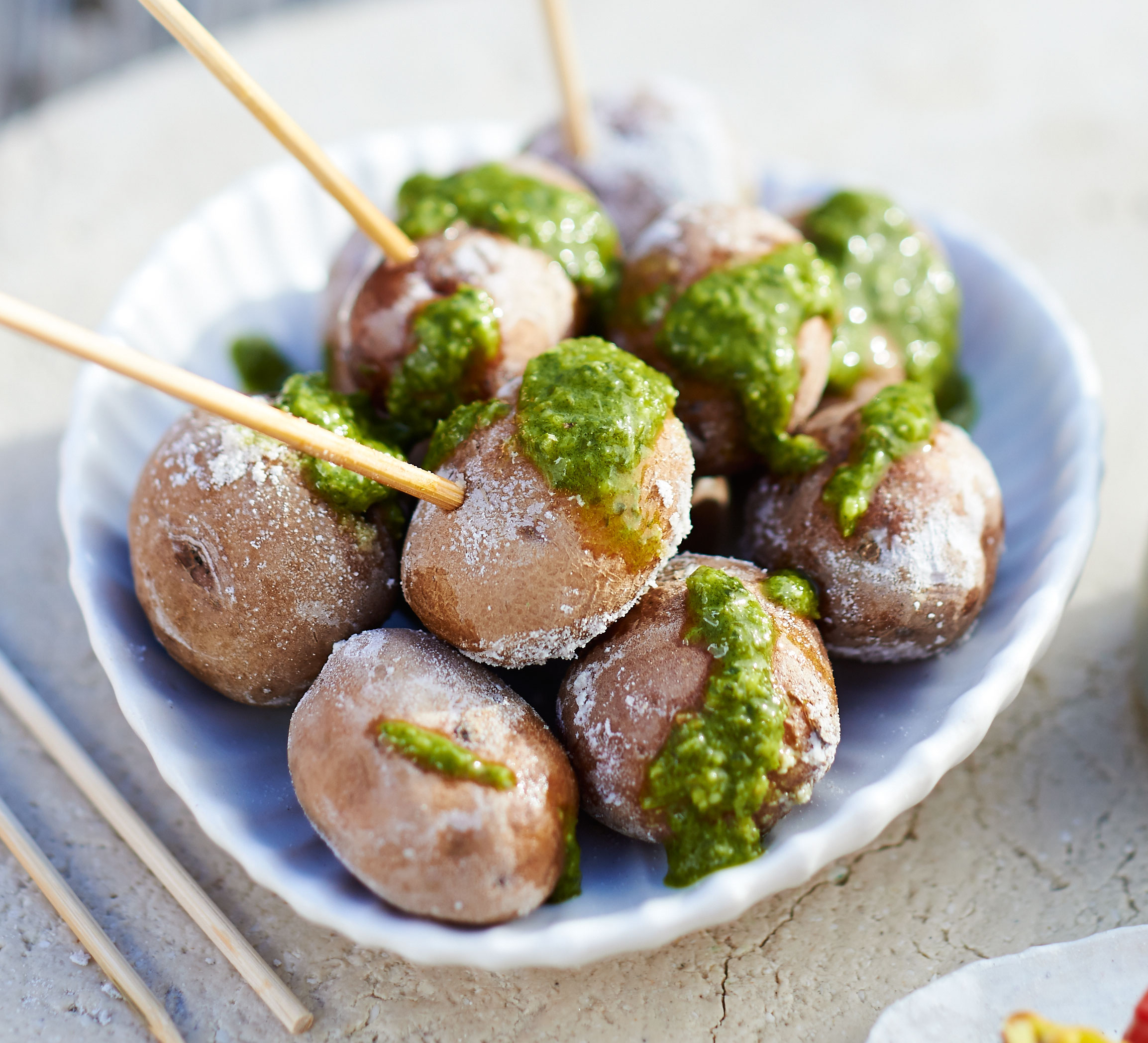 Baby potatoes in sea salt with herb salsa