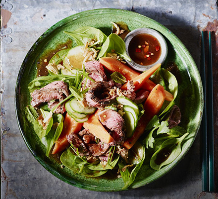 Seared beef & papaya salad with tamarind soy dressing