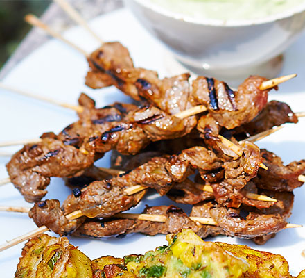 Harissa beef skewers with avocado dip