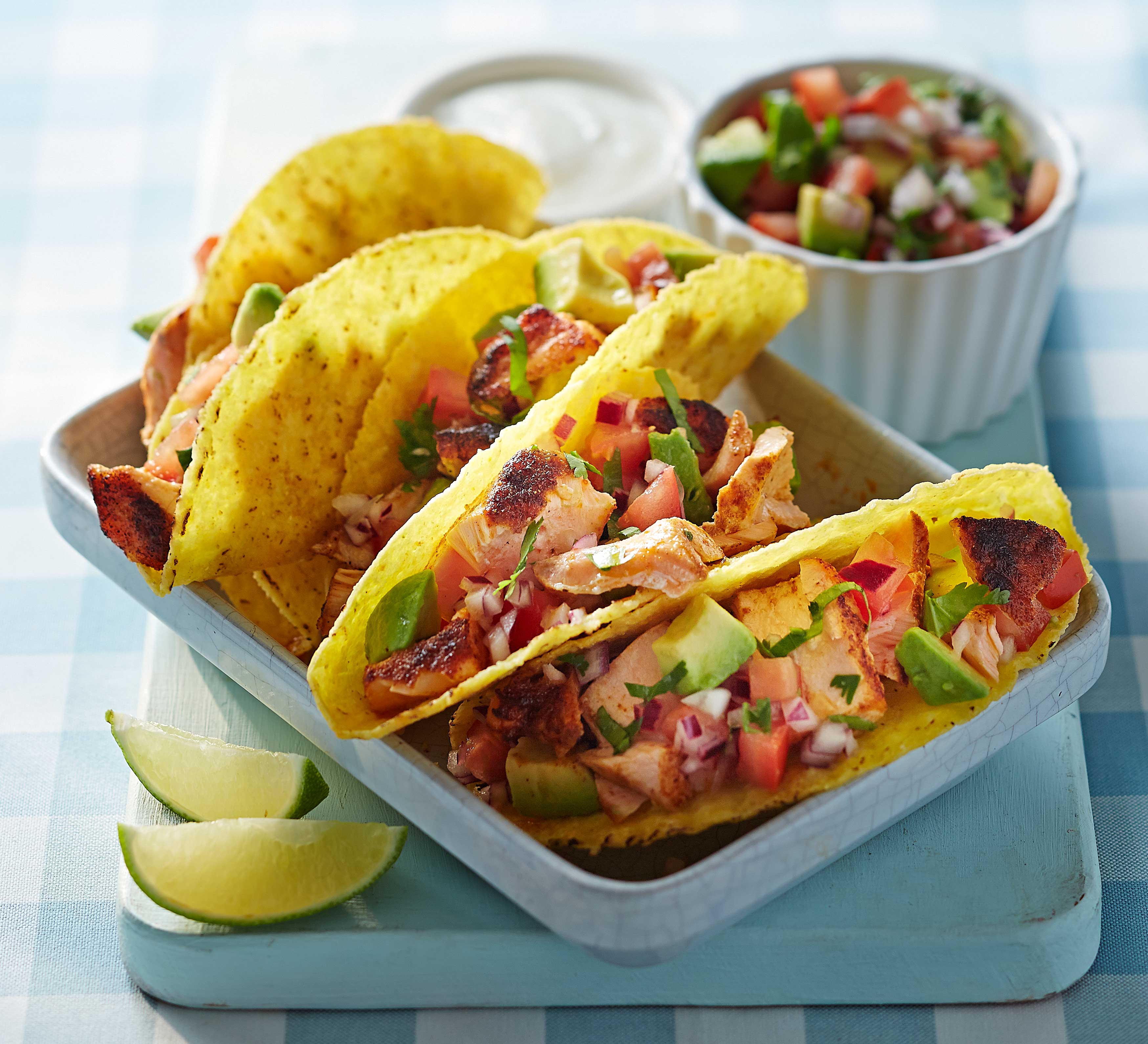 Grilled salmon tacos with avocado salsa