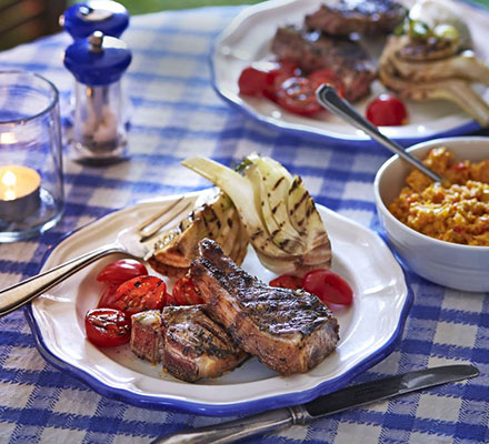 Marinated grilled lamb cutlets with creamed corn