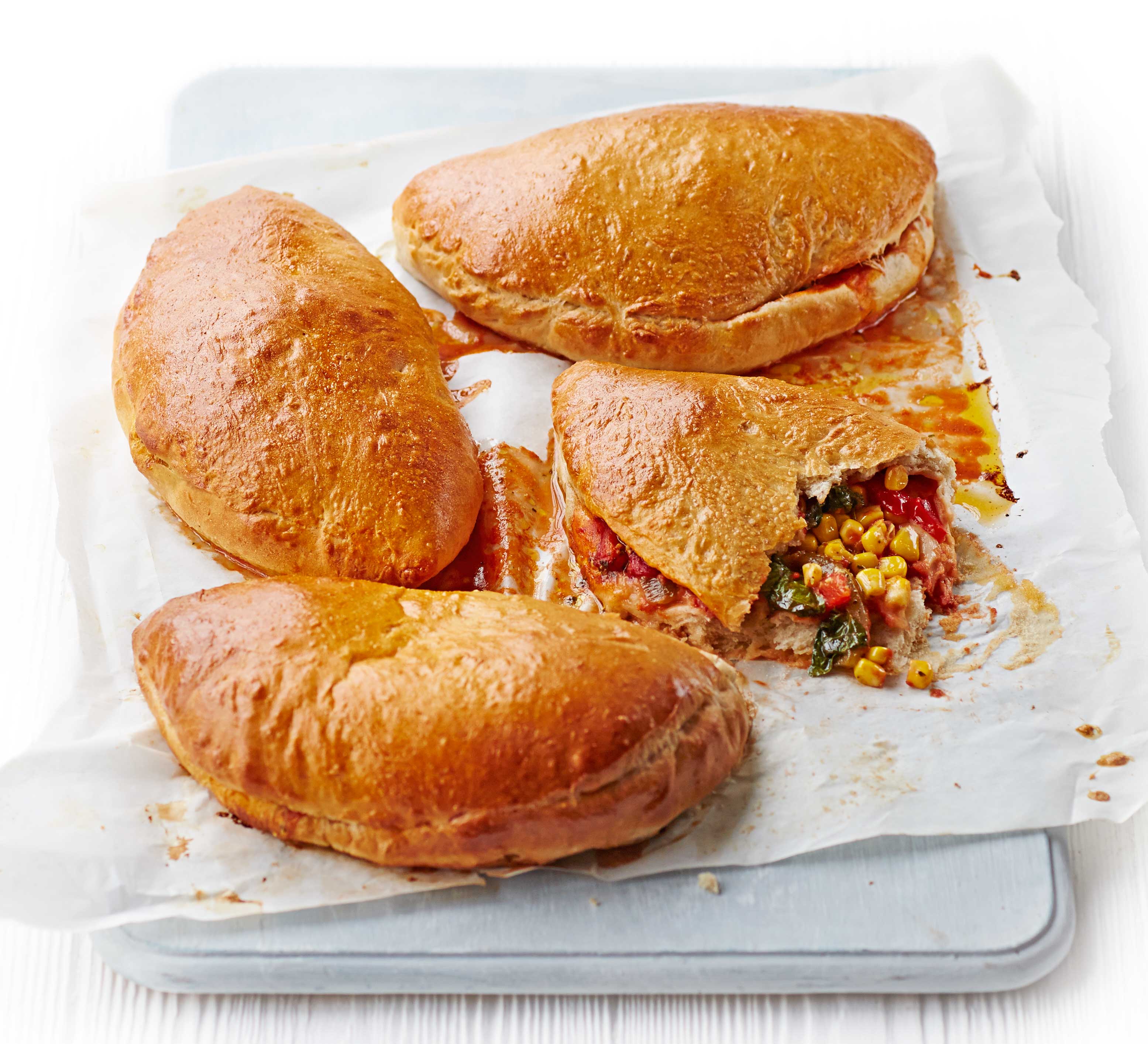 Pepper, pesto & sweetcorn calzones