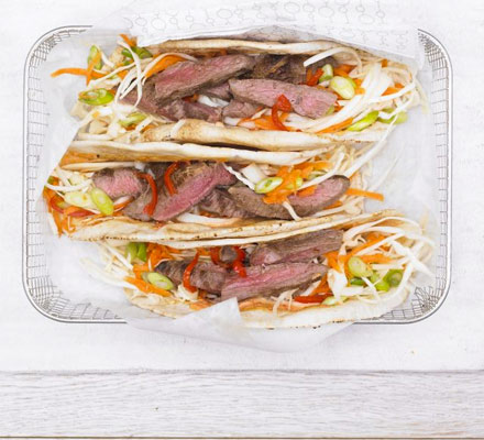 Hot cumin lamb wrap with crunchy slaw & spicy mayo