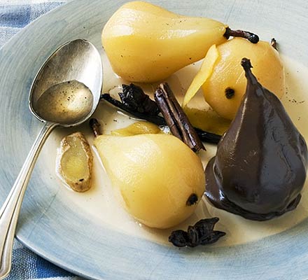 Spiced poached pears in chocolate sauce