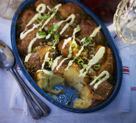 Crispy baked potatoes with spring onions