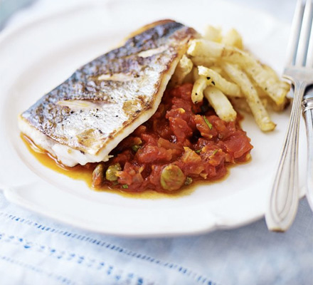 Pan-fried sea bass with puttanesca sauce & celeriac chips