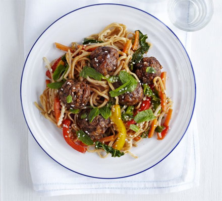 Black bean beef meatballs with stir-fried noodles