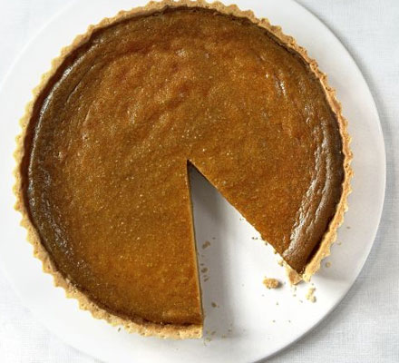 Classic pumpkin pie with pecan & maple cream