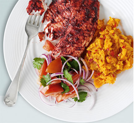 Tandoori tilapia with spicy sweet potato mash & tomato salad