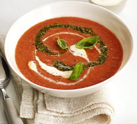 Rich tomato soup with pesto