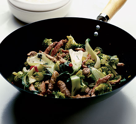 Spiced pork with heaps of stir-fried greens