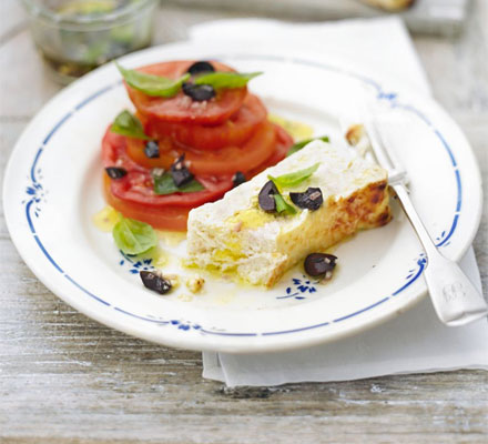 Parmesan-baked ricotta with tomato, olive & basil salad