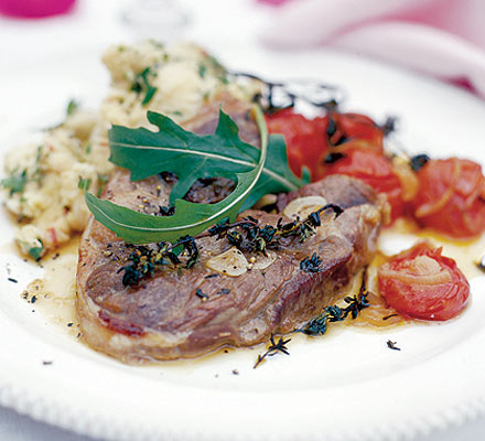 Marinated lamb steaks with paprika roast tomatoes & butterbean smash