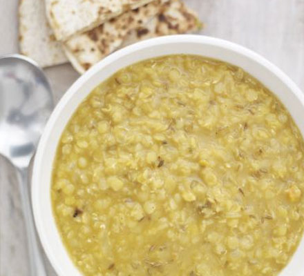 Spicy red lentil soup with cheese chapatis