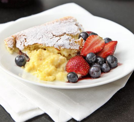 Luscious lemon pudding with summer berries