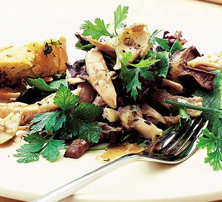 Warm chicken salad with garlic mushrooms