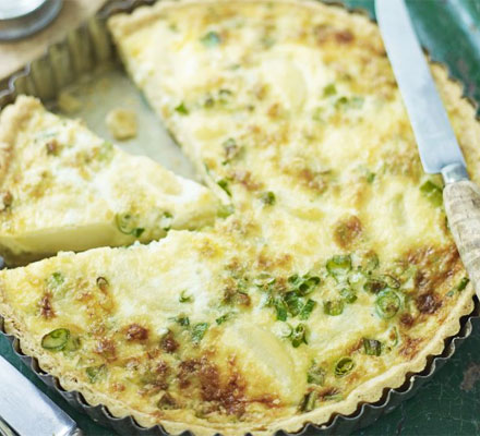 New potato, spring onion & Montgomery cheddar quiche