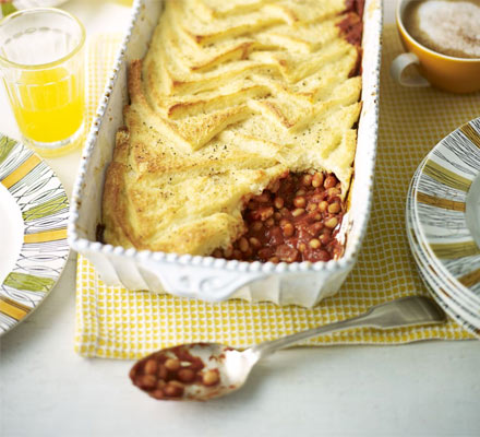 Smoky bean, bacon & eggy bread bake