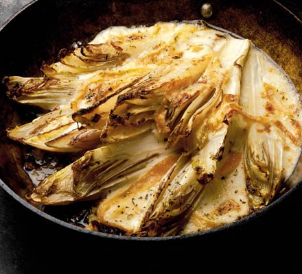 Wilted chicory with melted taleggio cheese