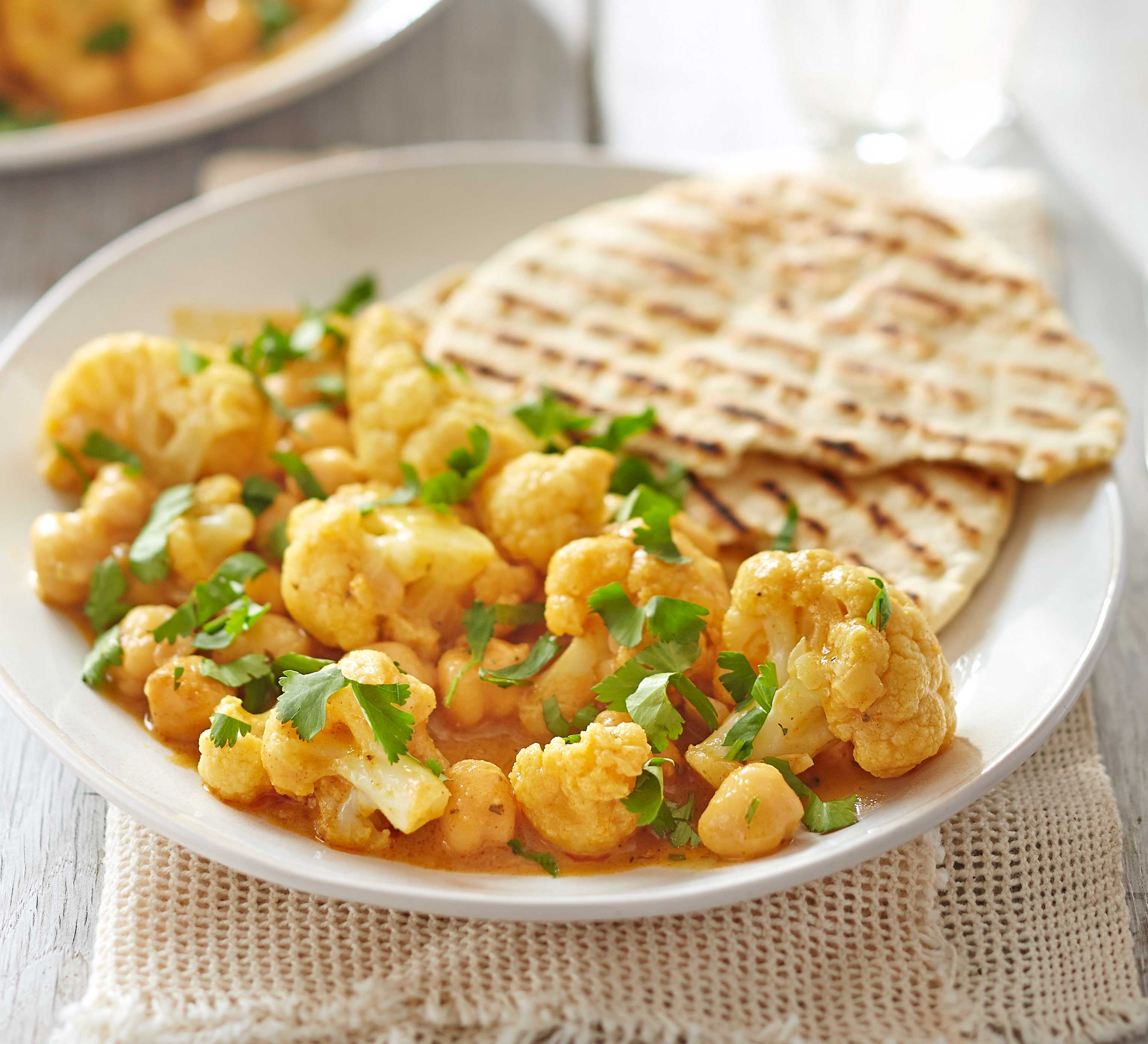 Satay cauliflower & chickpea curry with storecupboard flatbreads