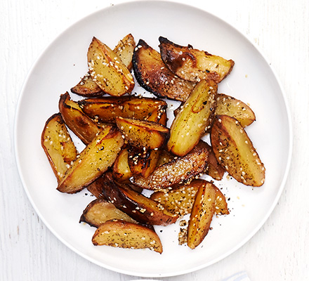 Sticky potato wedges with sesame & lemon